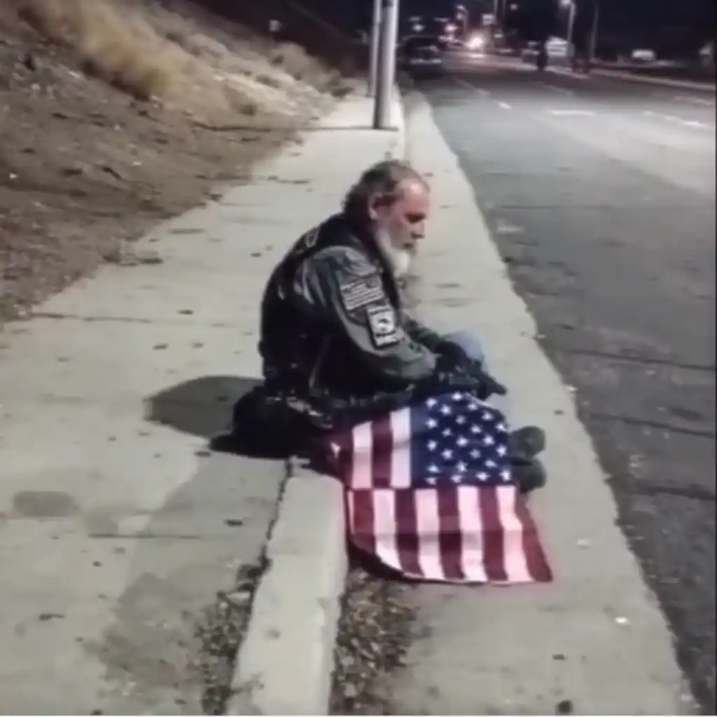 This Biker Sat on the Roadside Every Tuesday Night Holding an American Flag — Until I Finally Asked Him Why
